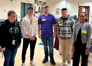 Intel volunteers and middle school students