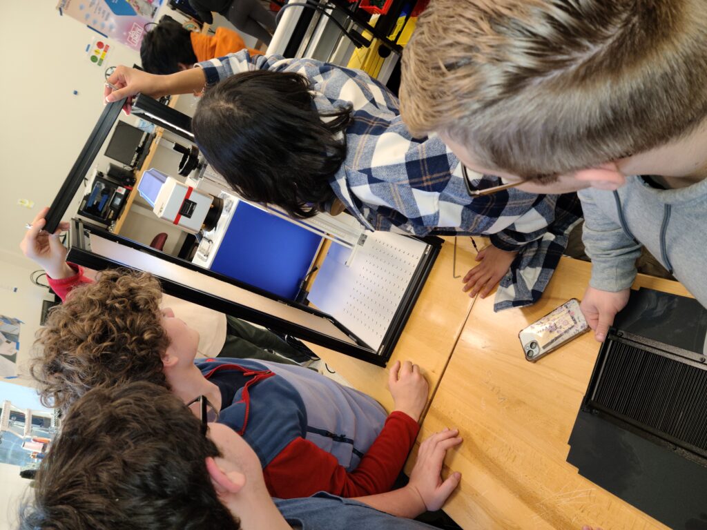 BASE students using the new etching machines