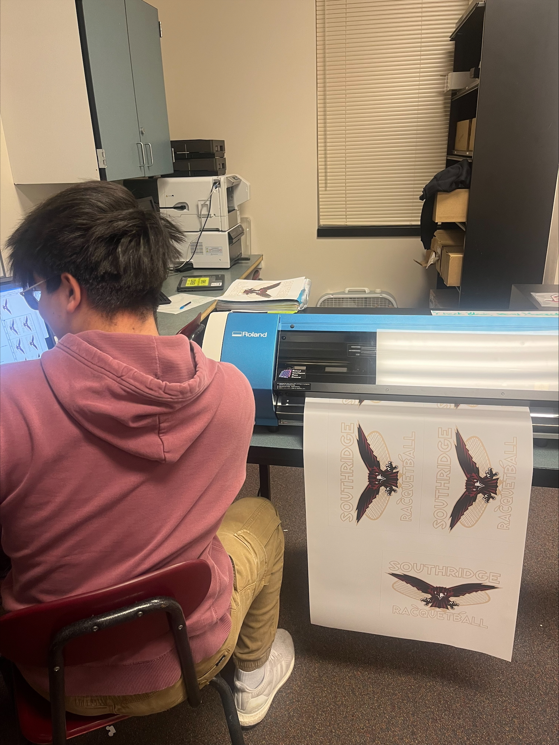 Student in Southridge High School Skyhawks Print Shop