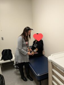 School nurse helping a student