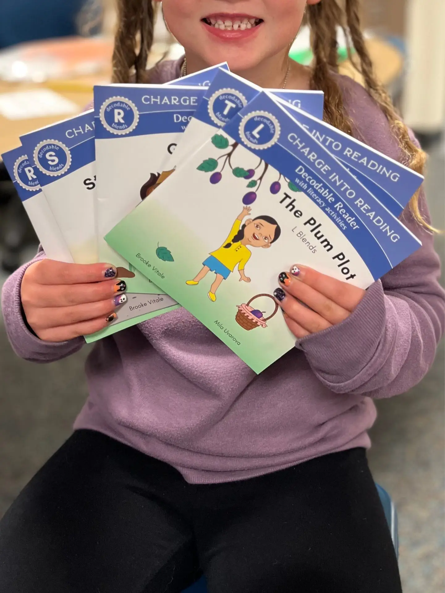 Girl smiling with book