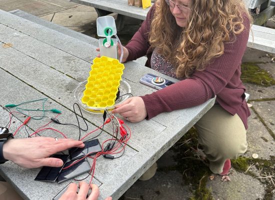 Teachers experimenting with design build solar powered fountains