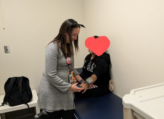 School nurse helping a student